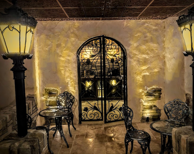 A custom wine cellar featuring the timeless look of metal.
