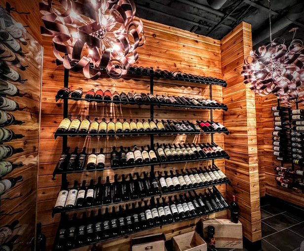 Metal wine racks in a wine cellar.