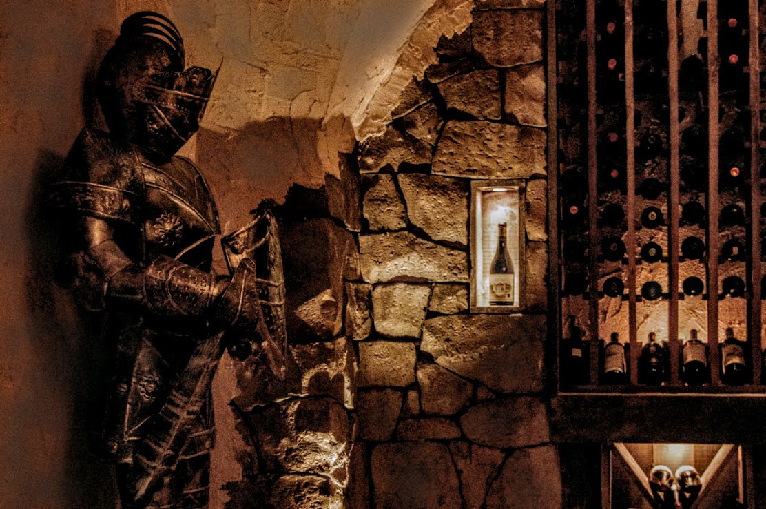 A wine cellar decorated with armor