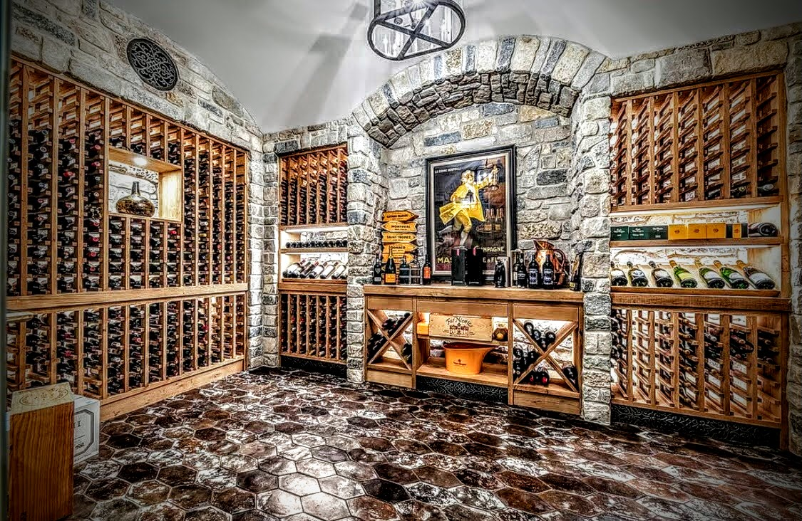 Baroque Design personalized wine cellar with stone walls and personalized decor