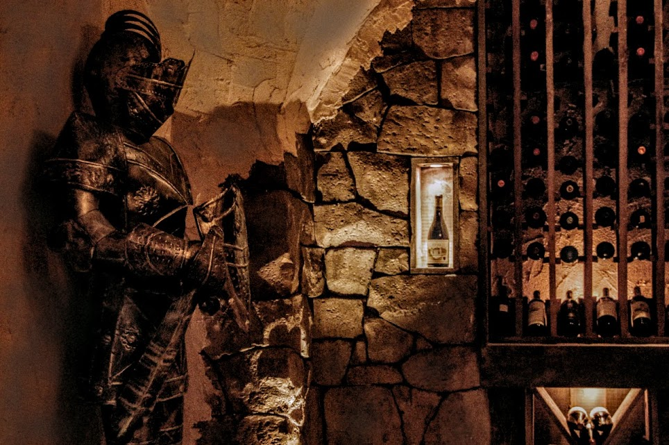 A wine room with a knight armor decoration piece