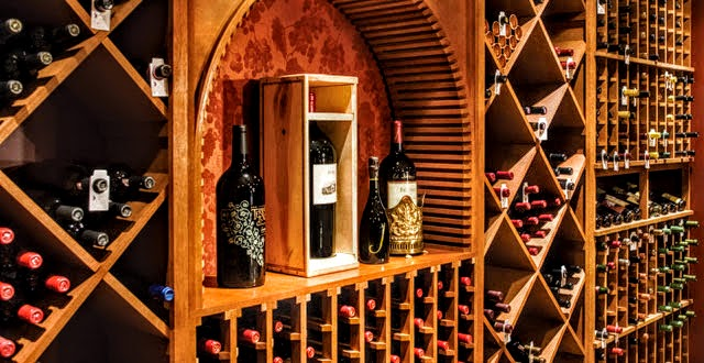 Luxury wine displayed on wooden racks