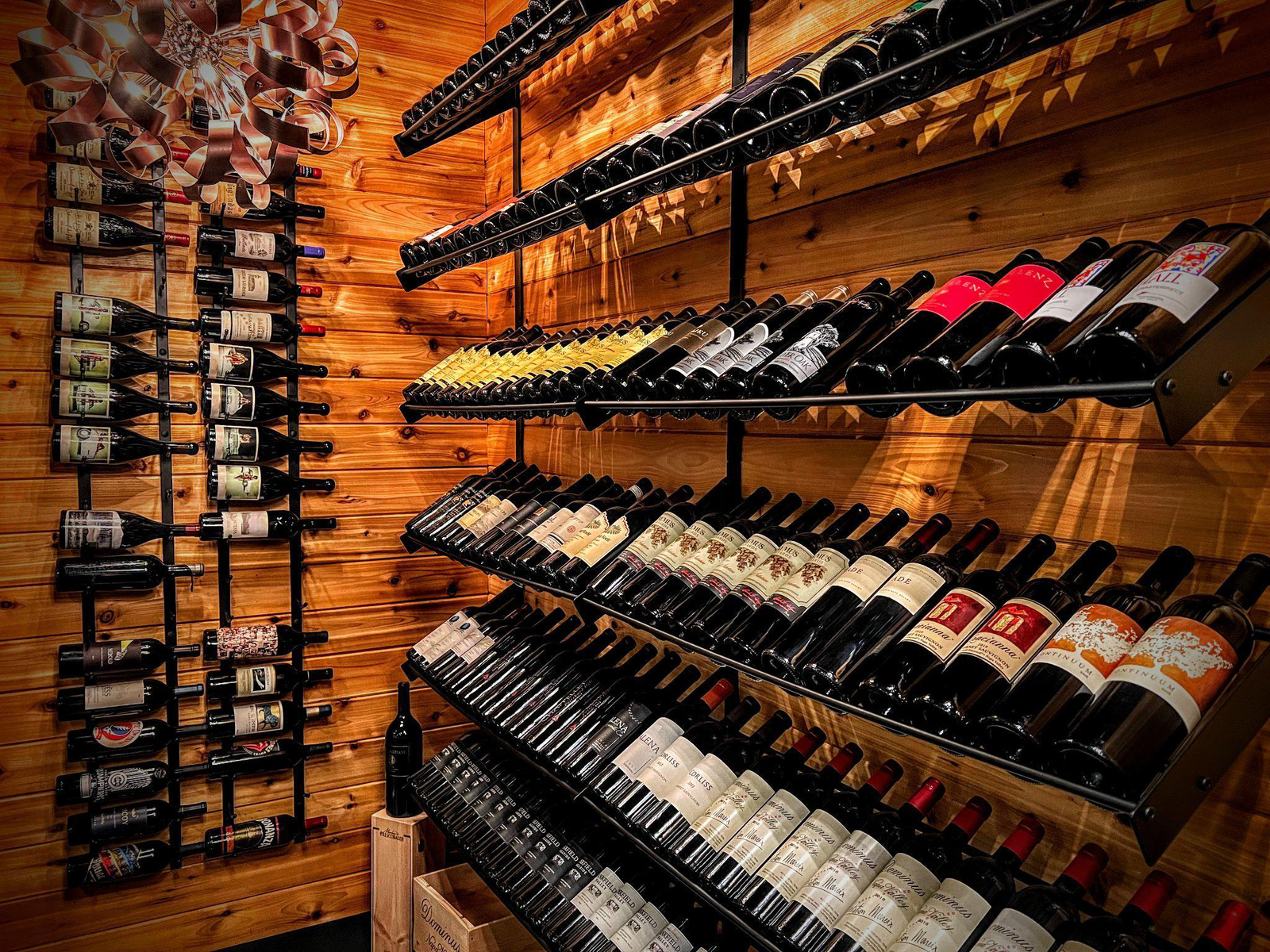 a wine cellar full of various brands of wine