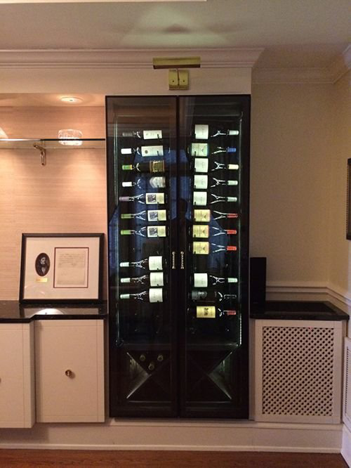 A large space with a wine cabine