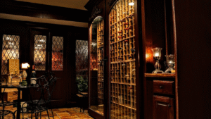 A wine cellar with glass-enclosed wine storage