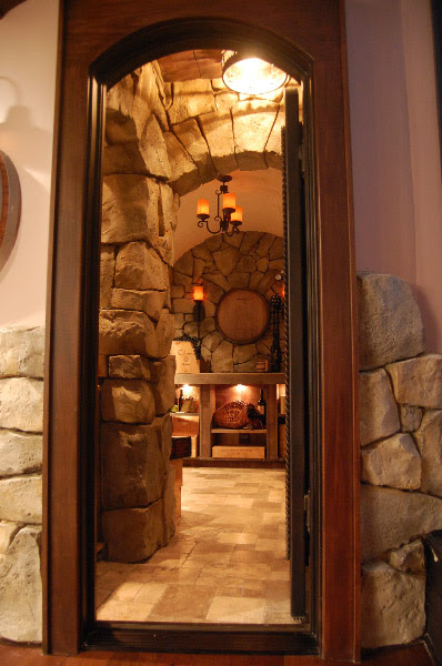 A door opening to a wine cellar